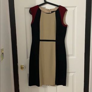nude and black womens dress